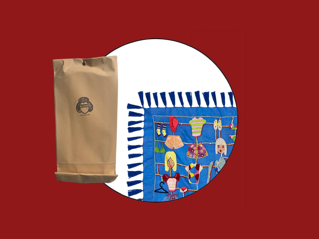 Tür 24: Besticktes „Paper Doll”-Tuch von Maison Common und Kunst von Ron Miller