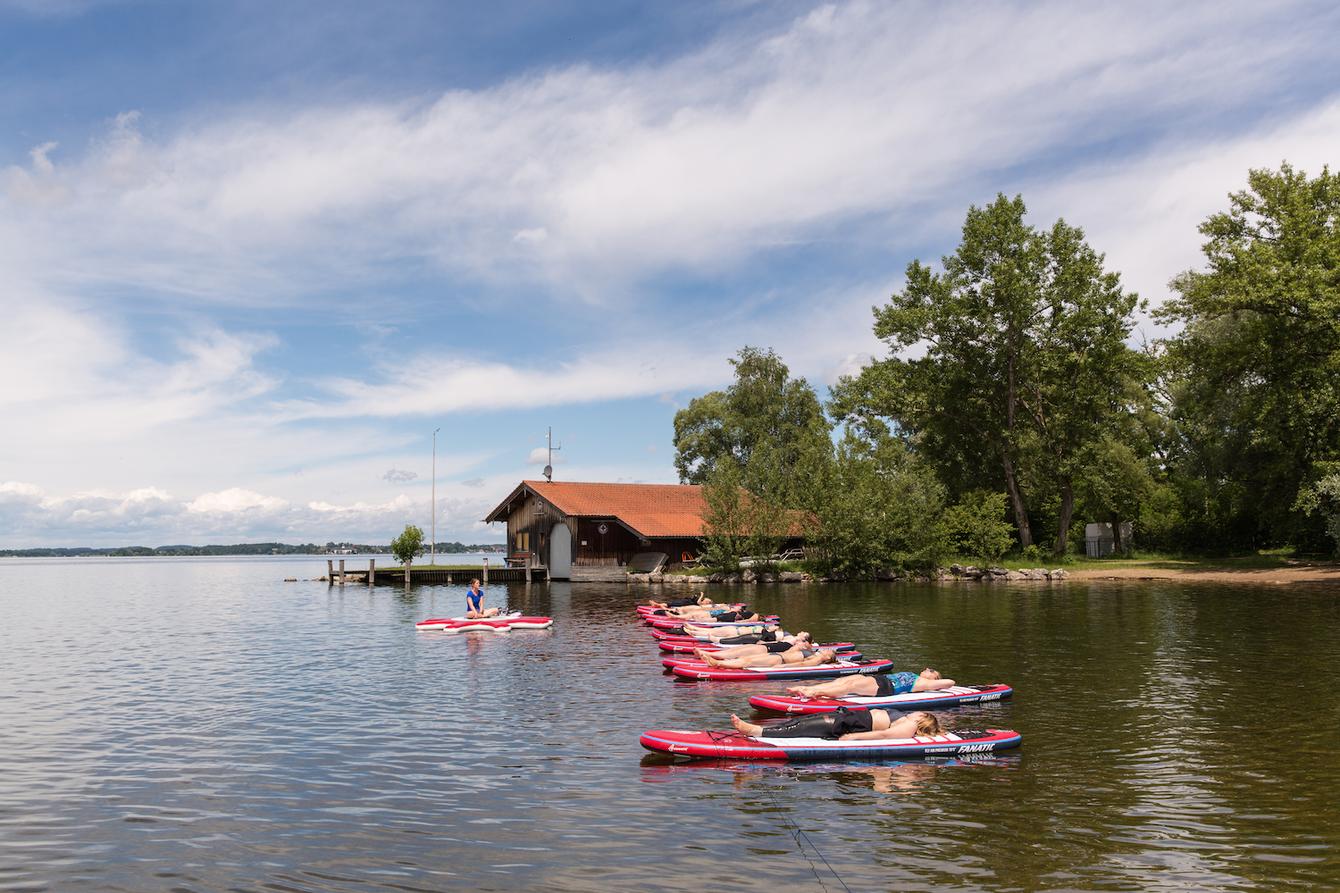 Stand up paddling yoga chiemsee modepilot